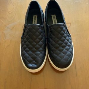 Steve Madden Quilted Black Slip On Shoes.